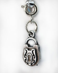 Traveler's Trinkets: Lock Charm